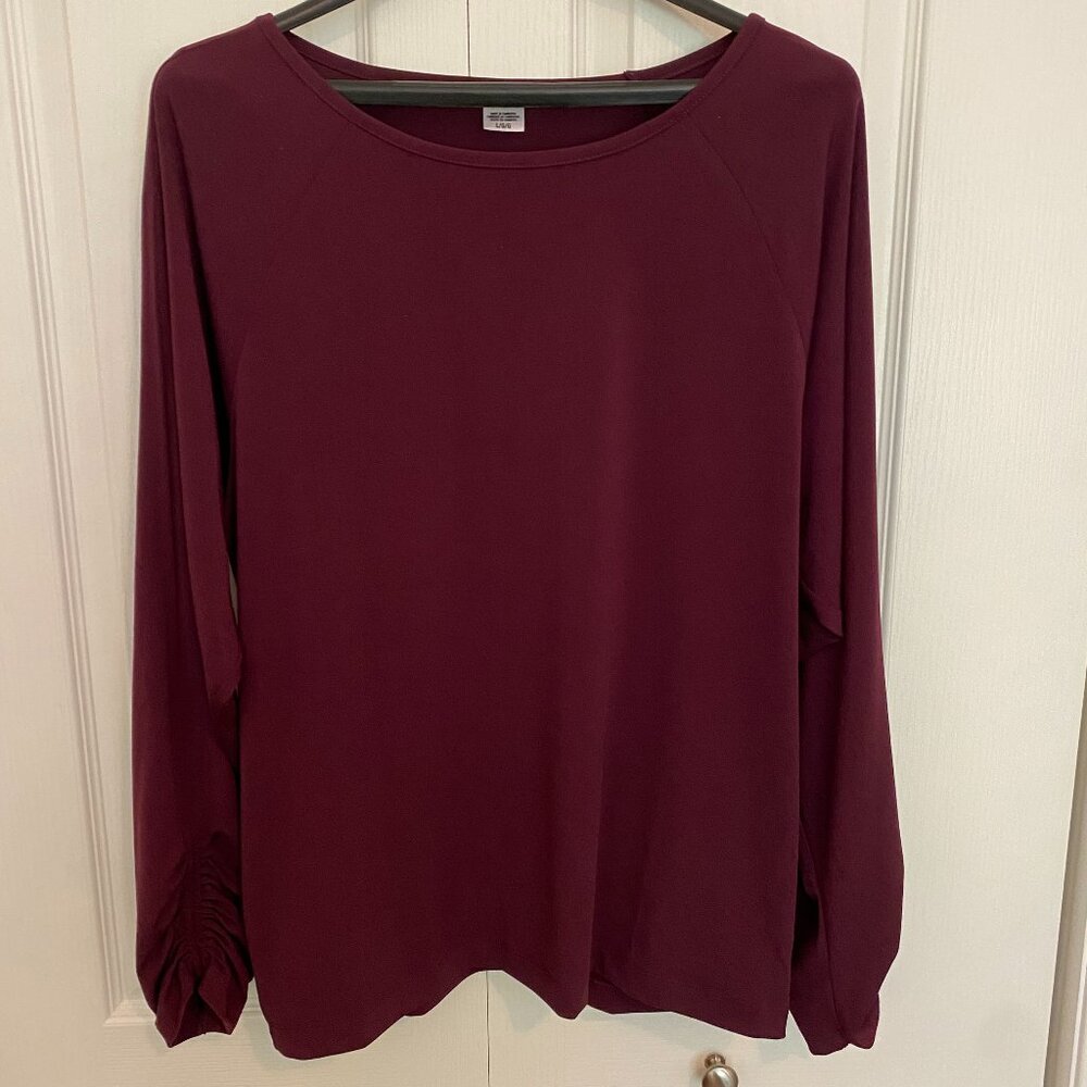 Loose fitting, active wear, long sleeved top